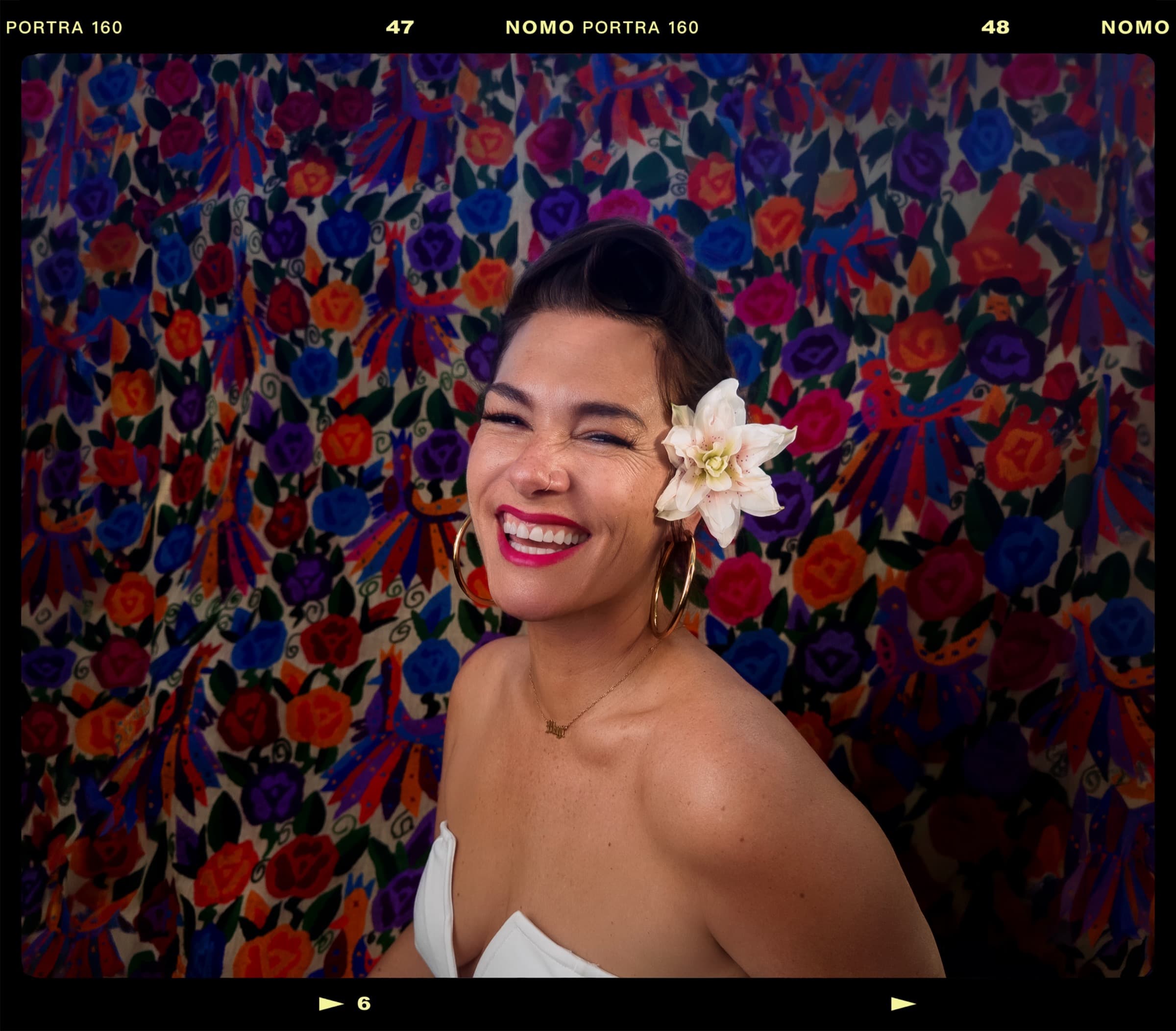 Elizabeth Lyon with floral backdrop and her name above